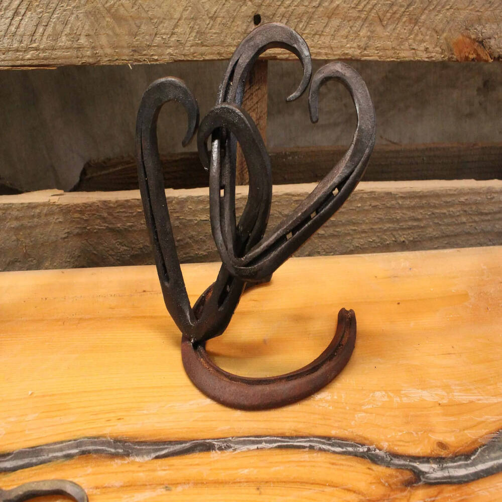 Hand-Forged Horseshoe Linked Hearts – Symbol of Unity & Love