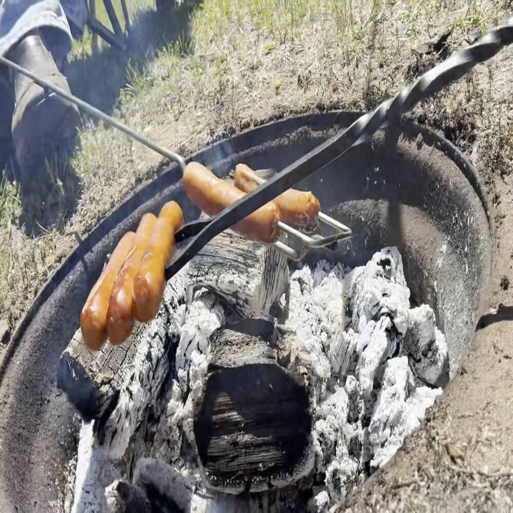 Squirrel Roaster & Campfire Cooking Fork – Hand-Forged Steel with Ground Stand